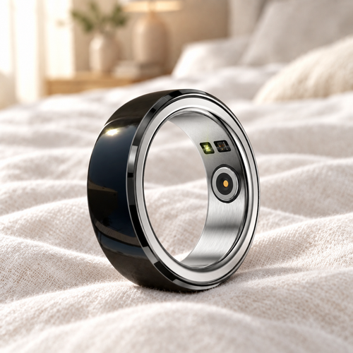 Glossy black and silver smart ring on soft natural linen surface with warm bedroom background